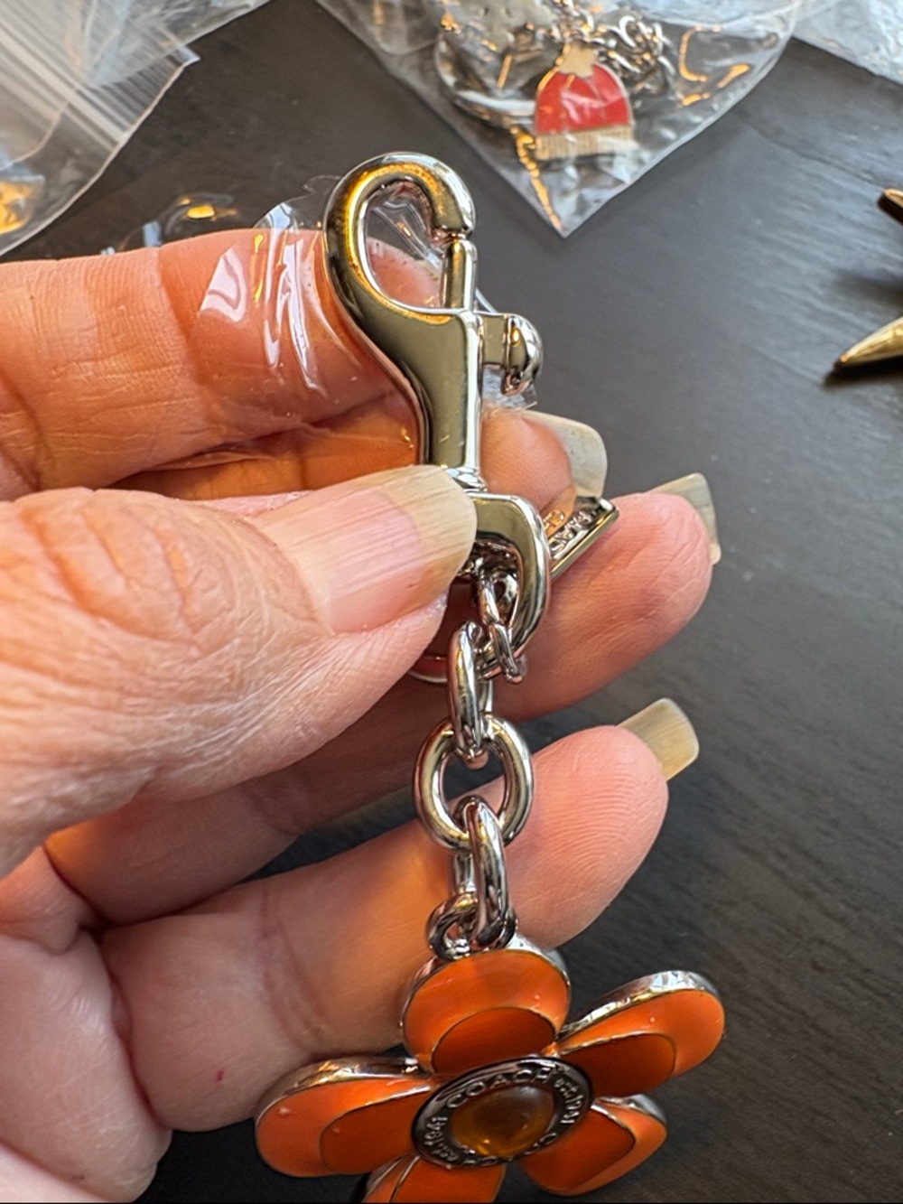 Coach Orange Enamel Flower Key Charm/Bag Jewelry with Silver Hardware - Picture 3 of 5